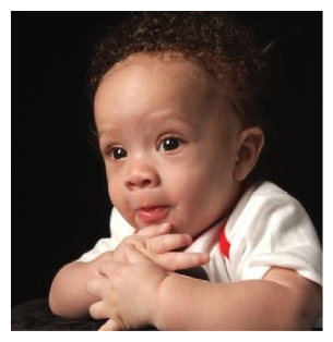 A baby is sitting on a cushion and looking at the camera. AI generated content