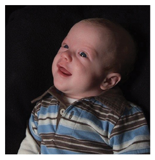 A baby wearing a striped shirt is smiling and looking up. AI generated content