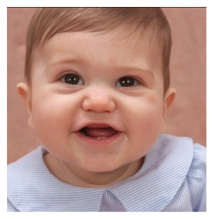A baby is smiling and has a blue and white striped shirt on. AI generated content
