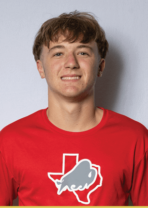 A young man wearing a white and black jersey with the number 14 on it. Description generated by AI