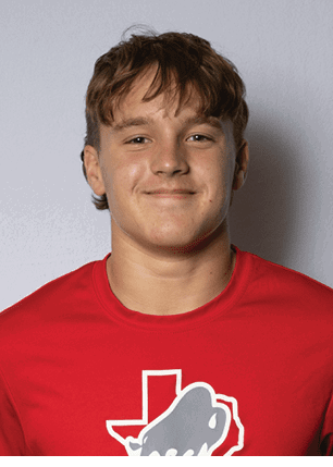 A young man wearing a white and black jersey with the number 14 on it. Description generated by AI