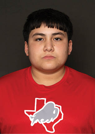 A young man wearing a white and black jersey with the number 14 on it. Description generated by AI