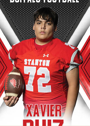 A young man wearing a white and black jersey with the number 14 on it. Description generated by AI