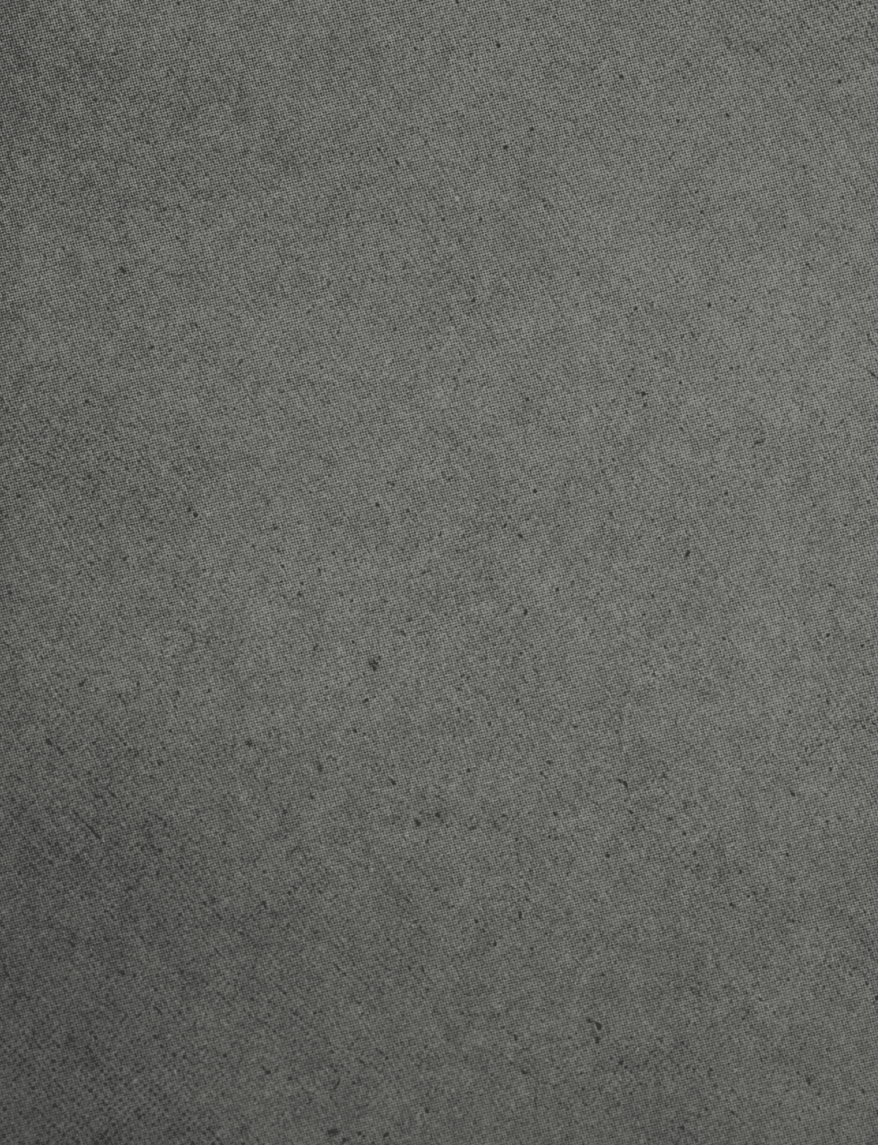 A red fabric with a pattern. Description generated by AI