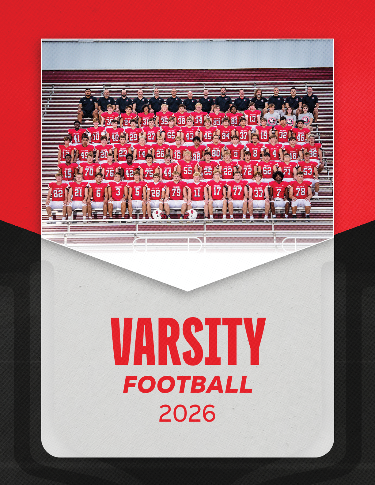 A large group of people wearing red football uniforms and black shirts are posed in rows on bleachers with the text varsity football 2026 below them. Description generated by AI