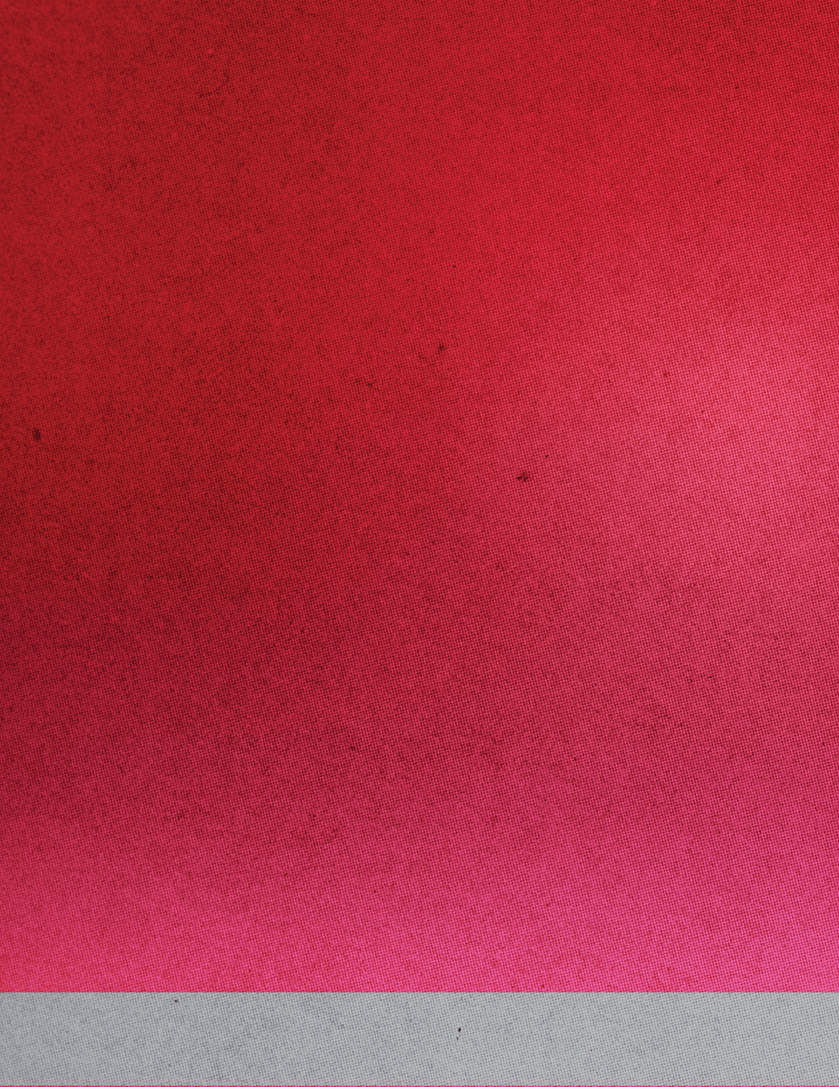 A yellowish-brown sky with a few clouds. Description generated by AI