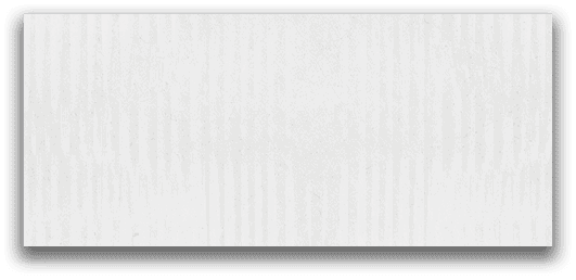 A close-up view of a white textured surface with subtle vertical ridges and a soft shadow around the edges. Description generated by AI