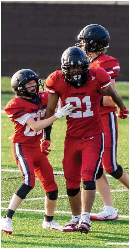 A football player wearing a blue jersey with the number 58 on it. Description generated by AI