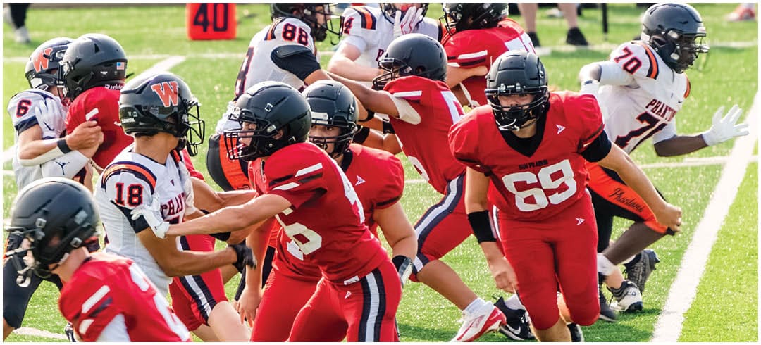 A football player wearing a blue jersey with the number 58 on it. Description generated by AI
