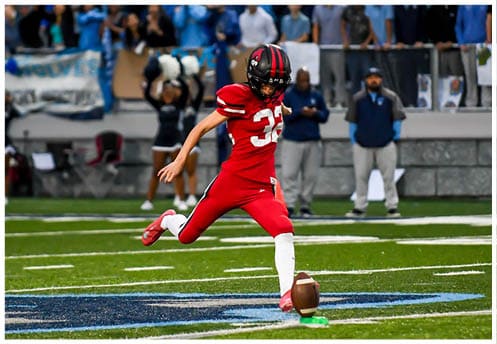 A football player running on the field. Description generated by AI