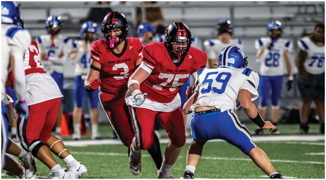 A football player wearing a blue jersey with the number 58 on it. Description generated by AI
