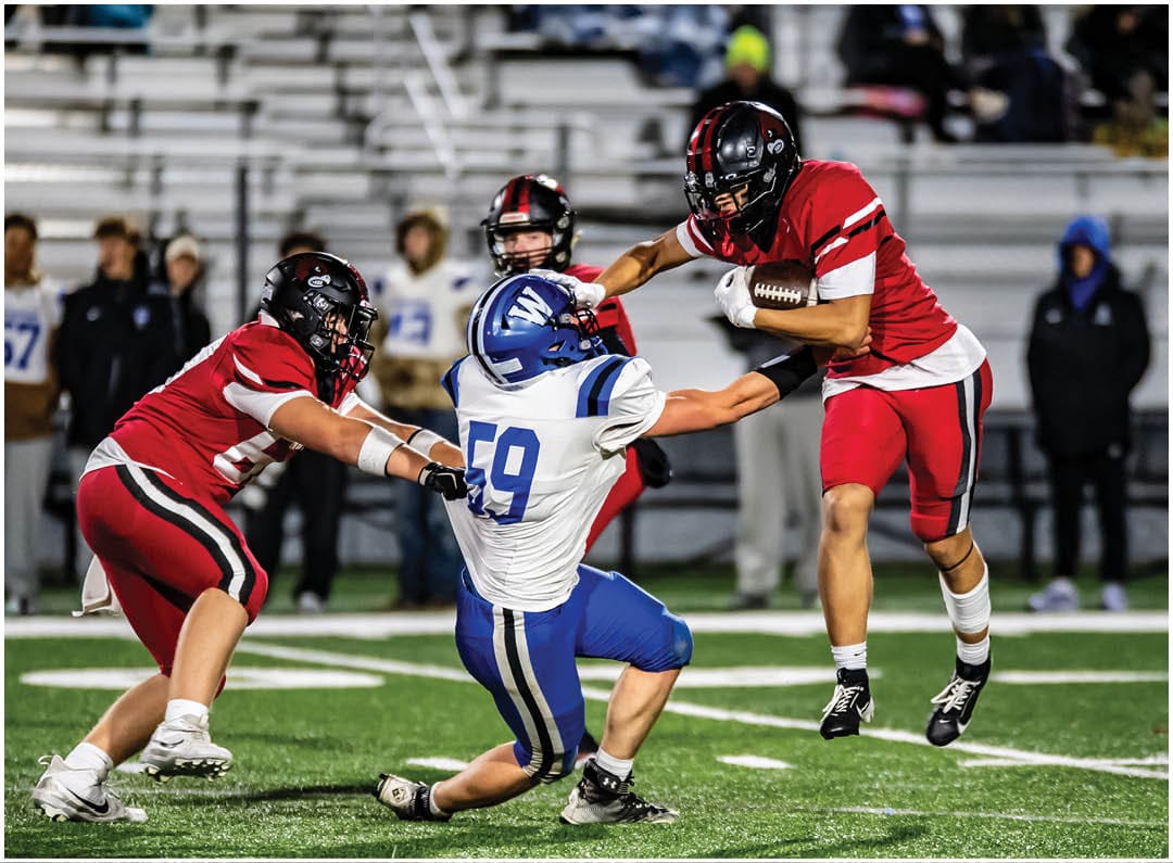 A football player wearing a blue jersey with the number 58 on it. Description generated by AI