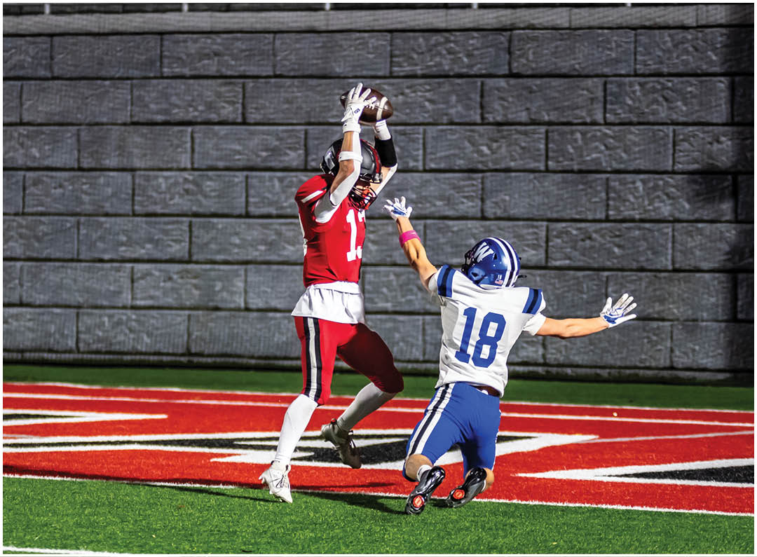 A football player wearing a blue jersey with the number 58 on it. Description generated by AI