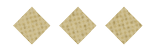 Three beige diamond-shaped crackers with a waffle pattern are arranged in a row on a white background. Description generated by AI
