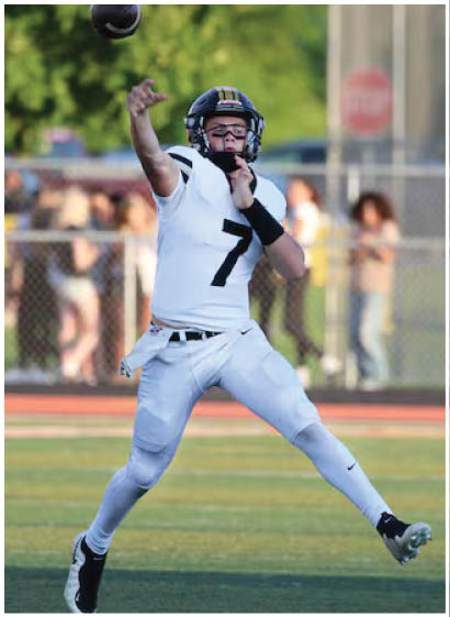 A football player wearing a blue jersey with the number 58 on it. Description generated by AI