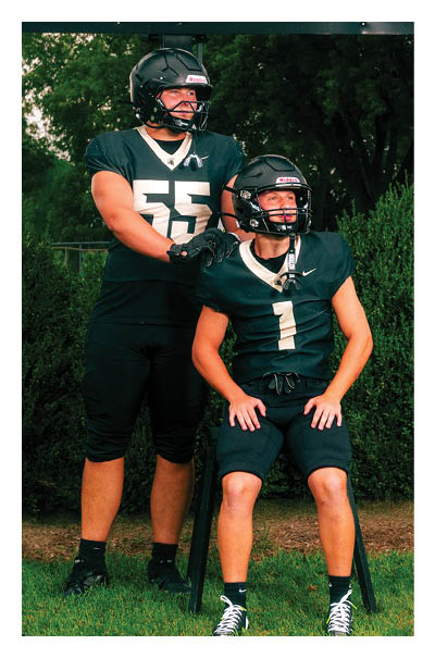 A young man wearing a football jersey with the name Vista on the back. AI generated content