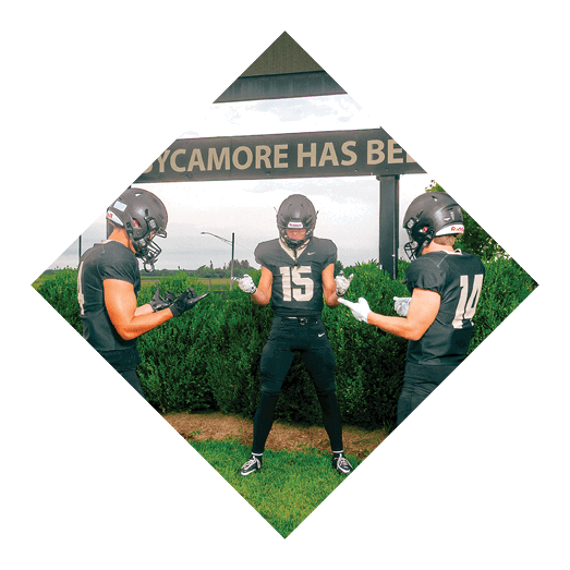 A female football player is kicking a football on a field. AI generated content