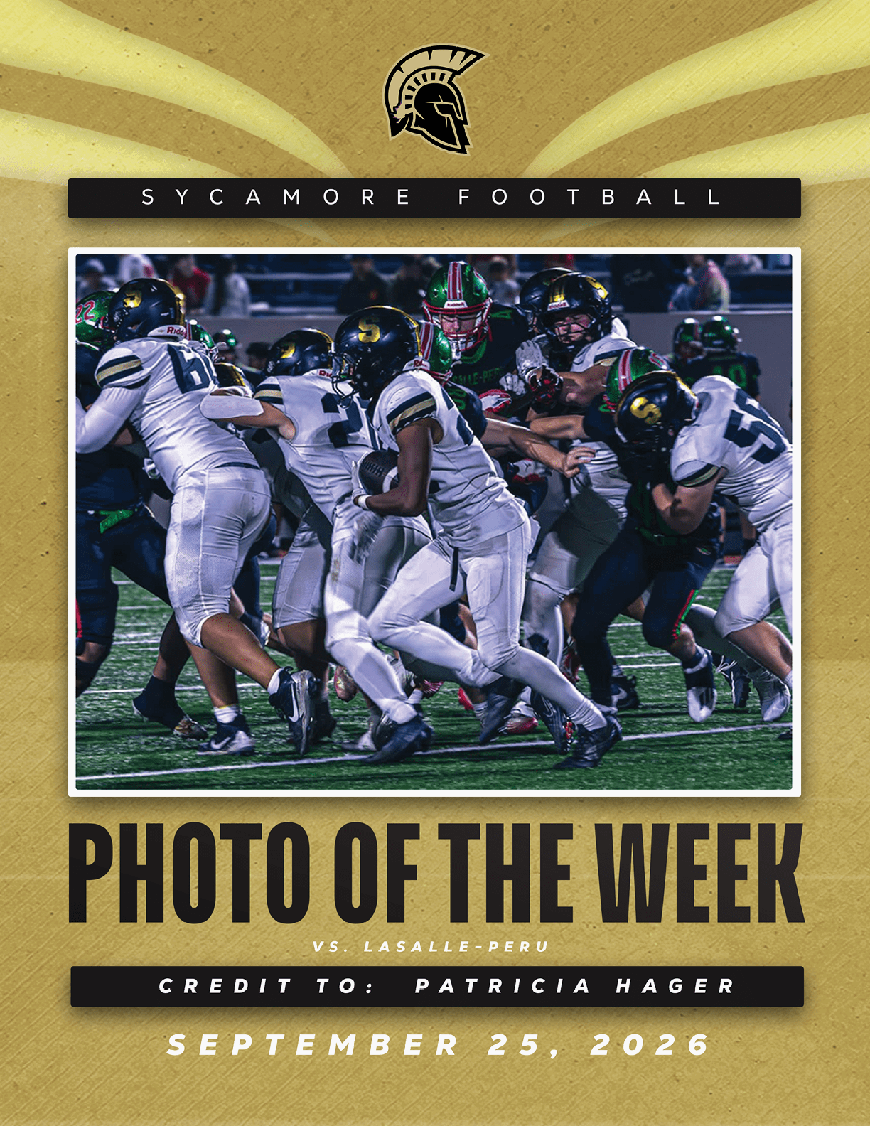 A group of football players in white uniforms are actively engaged in a play on a green field during a game between Sycamore and LaSalle-Peru. Description generated by AI