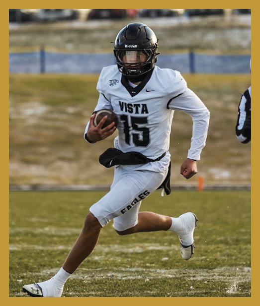 A football player in a white uniform is running with a football in his hand. AI generated content