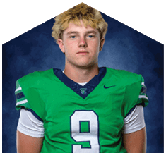 A young man wearing a white jersey with the number 10 on it. Description generated by AI