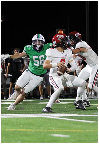 A group of football players celebrating a touchdown. Description generated by AI
