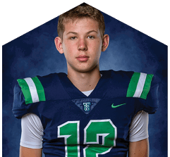 A young man wearing a white jersey with the number 10 on it. Description generated by AI