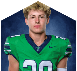 A young man wearing a white jersey with the number 10 on it. Description generated by AI