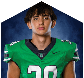 A young man wearing a white jersey with the number 10 on it. Description generated by AI