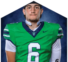 A young man wearing a white jersey with the number 10 on it. Description generated by AI