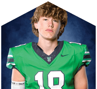 A young man wearing a white jersey with the number 10 on it. Description generated by AI