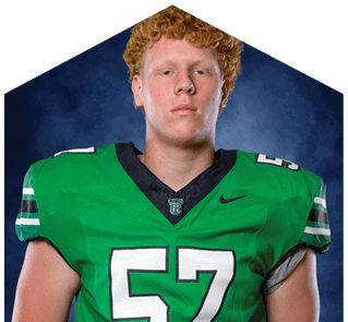 A young man wearing a white jersey with the number 10 on it. Description generated by AI