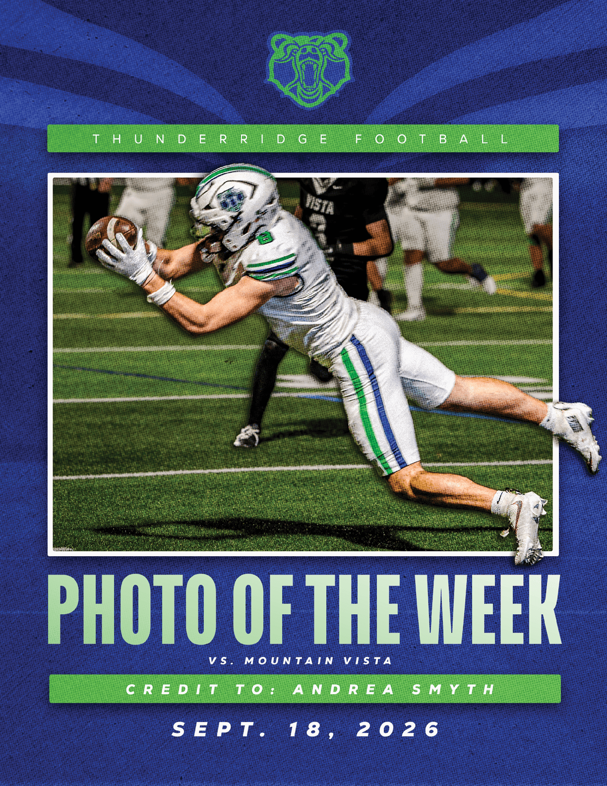 A football player in a green jersey is jumping in the air. Description generated by AI