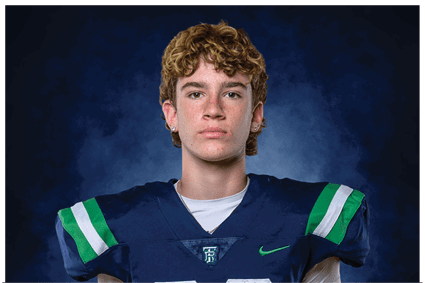 A young man wearing a white jersey with the number 10 on it. Description generated by AI