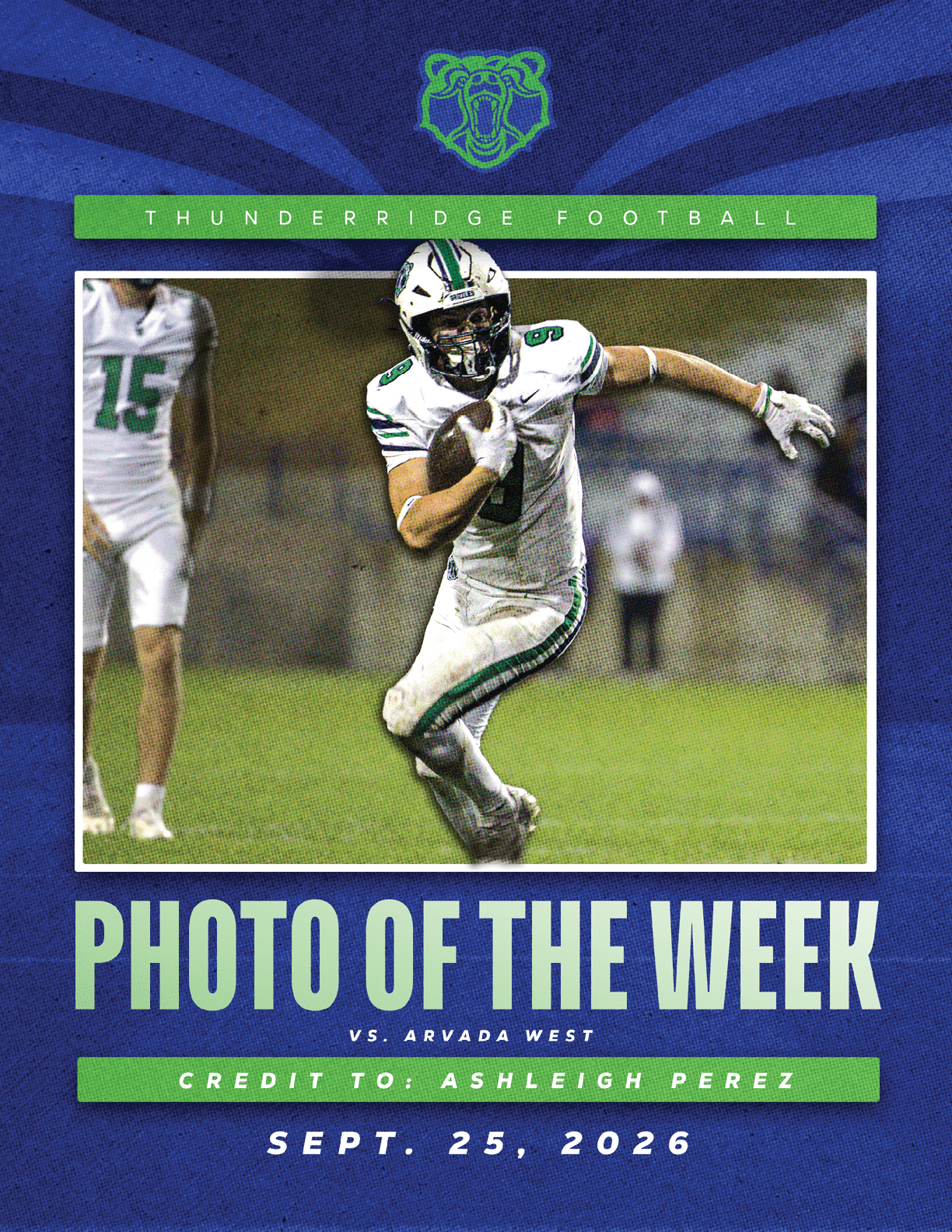 A football player in a green jersey is jumping in the air. Description generated by AI