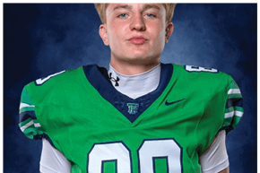 A young man wearing a white jersey with the number 10 on it. Description generated by AI