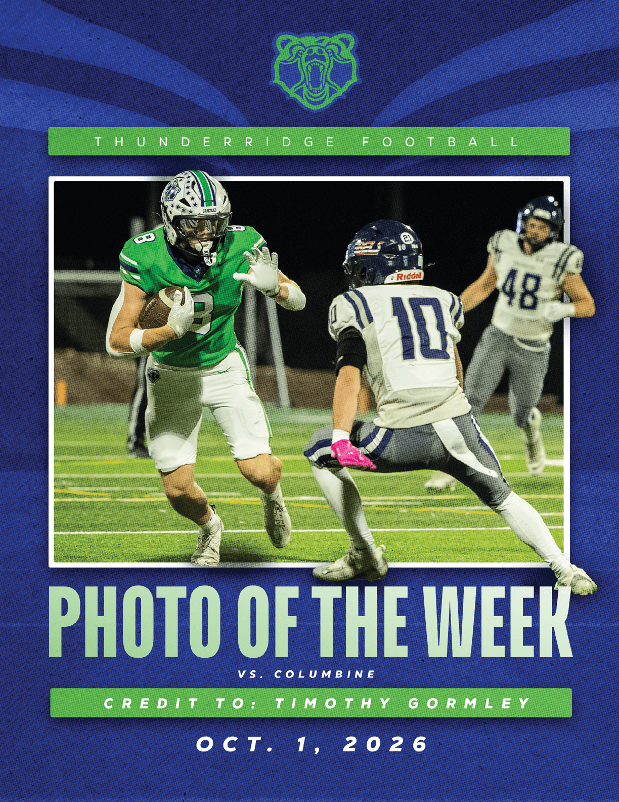 A football player in a green jersey is jumping in the air. Description generated by AI