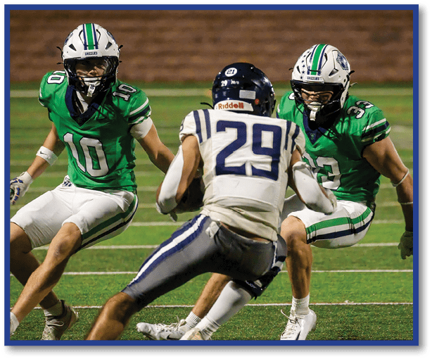 A group of football players wearing black jerseys with the number 3 on them. Description generated by AI