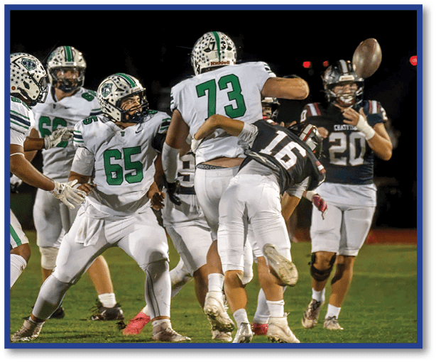 A group of football players wearing black jerseys with the number 3 on them. Description generated by AI