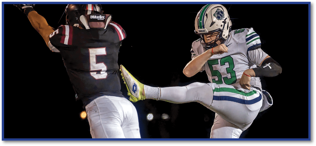A football player running on the field. Description generated by AI