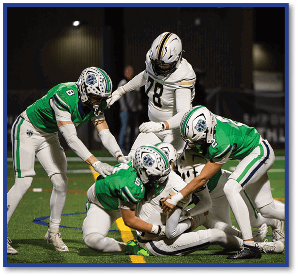 A group of football players wearing black jerseys with the number 3 on them. Description generated by AI