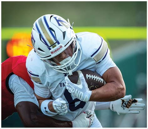 A football player wearing a blue jersey with the number 58 on it. Description generated by AI