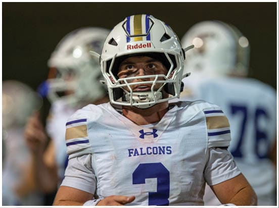 A football player wearing a blue jersey with the number 58 on it. Description generated by AI