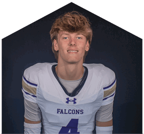 A young man wearing a white jersey with the number 0 on it. Description generated by AI