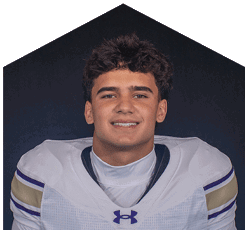 A young man wearing a white jersey with the number 0 on it. Description generated by AI