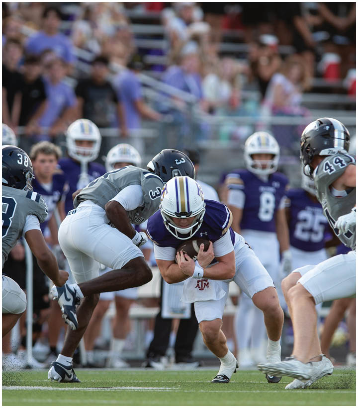 A group of football players on the field. Description generated by AI