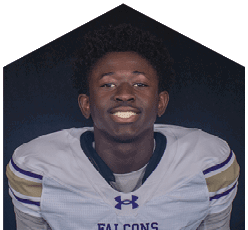 A young man wearing a white jersey with the number 0 on it. Description generated by AI