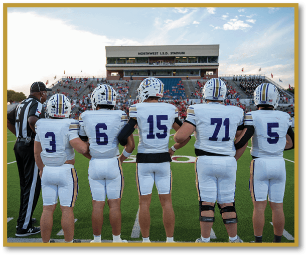 A group of football players wearing black jerseys with the number 3 on them. Description generated by AI
