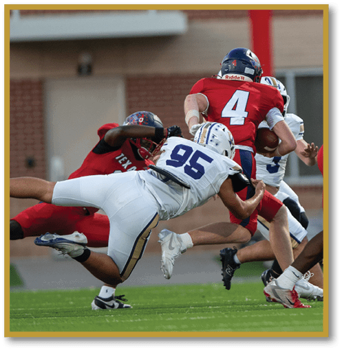 Two football players wearing black jerseys with the number 11 on them. Description generated by AI
