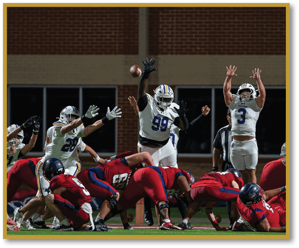 A group of football players wearing black jerseys with the number 3 on them. Description generated by AI