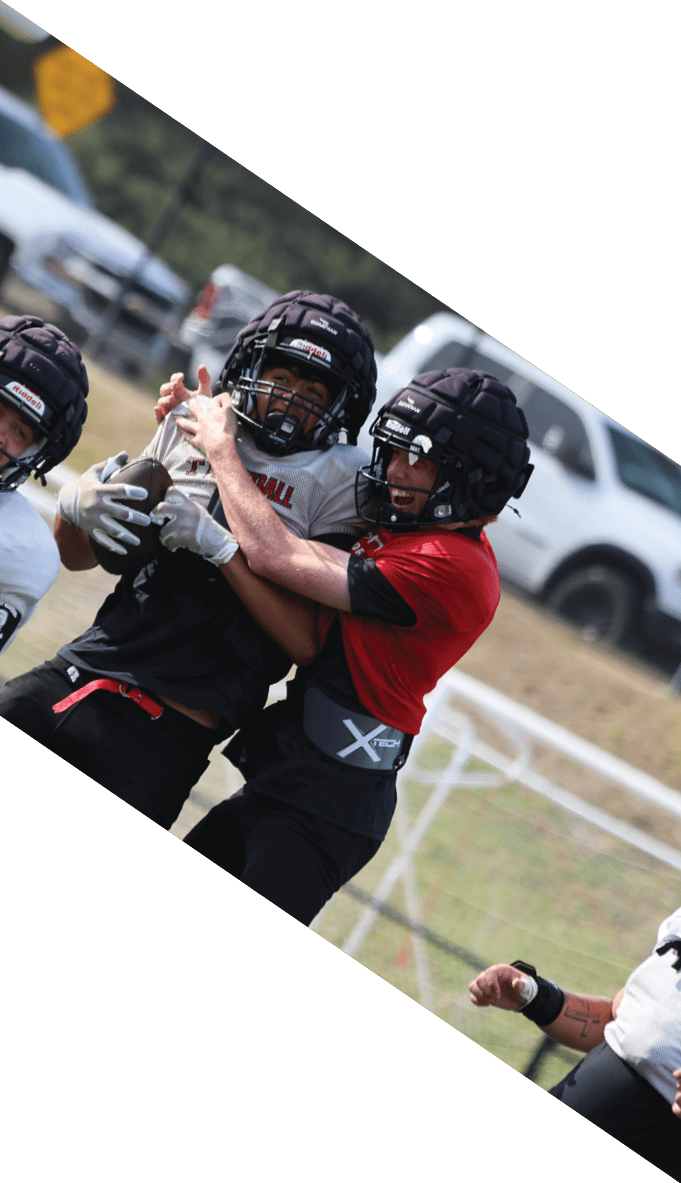 A football team is gathered around a coach, listening to his instructions. AI generated content